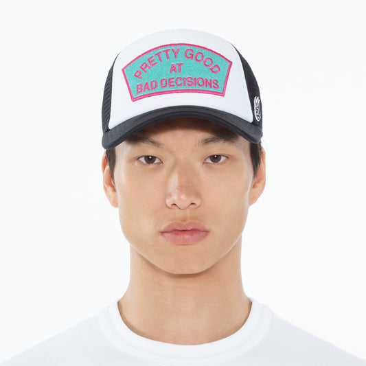 Cult's "Good At Bad Decisions" Mesh Back Trucker Hat in White