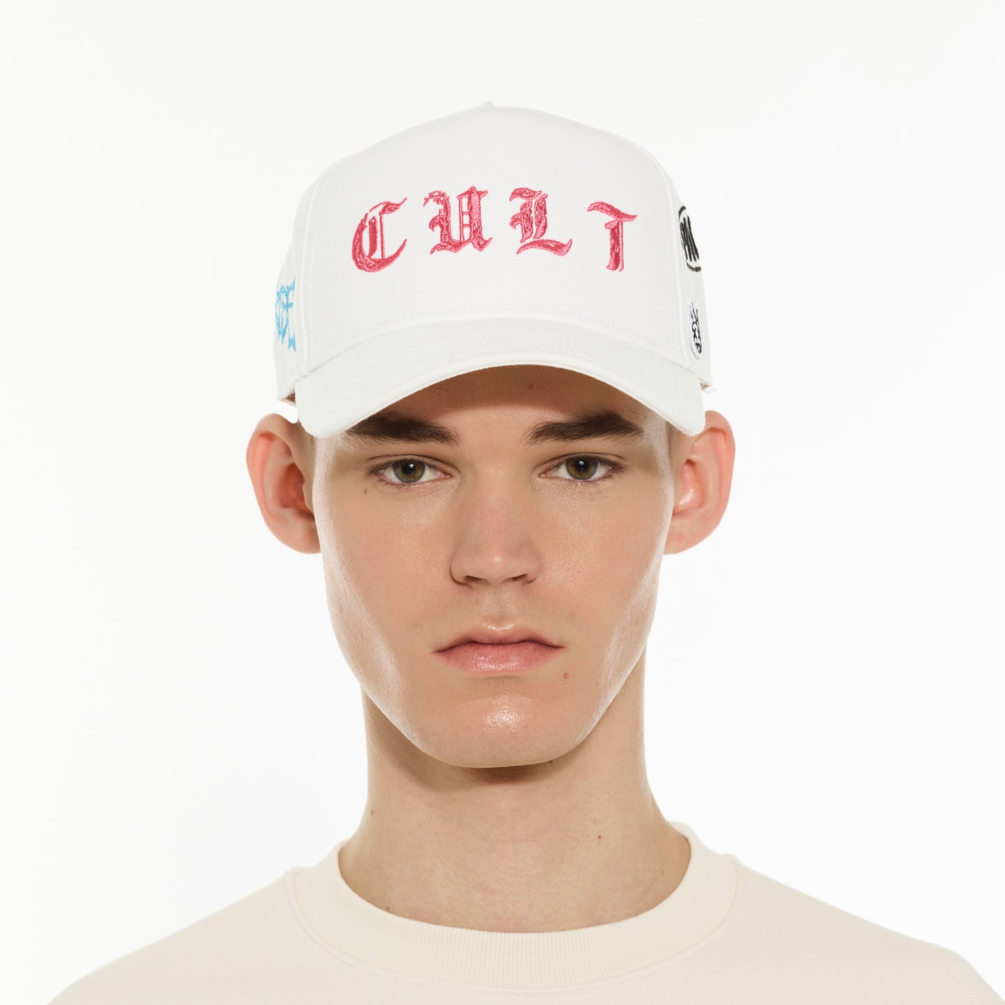 Cult's Logo Mesh Back Trucker Hat "Cult Community" in Winter White