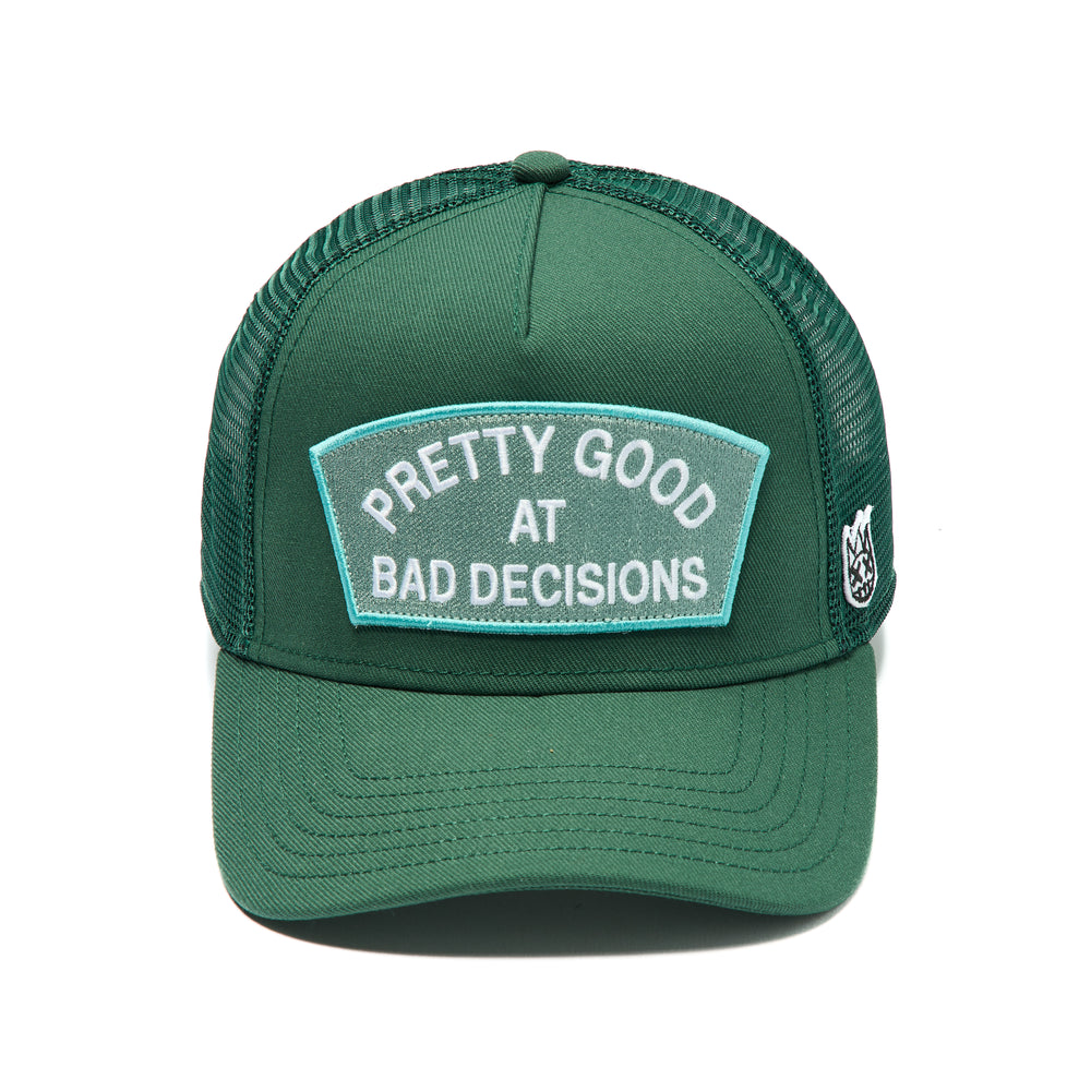 Cult's Mesh Trucker Hat "Good At Bad Decisions" In Bayberry