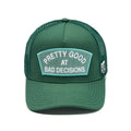 Cult's Mesh Trucker Hat "Good At Bad Decisions" In Bayberry