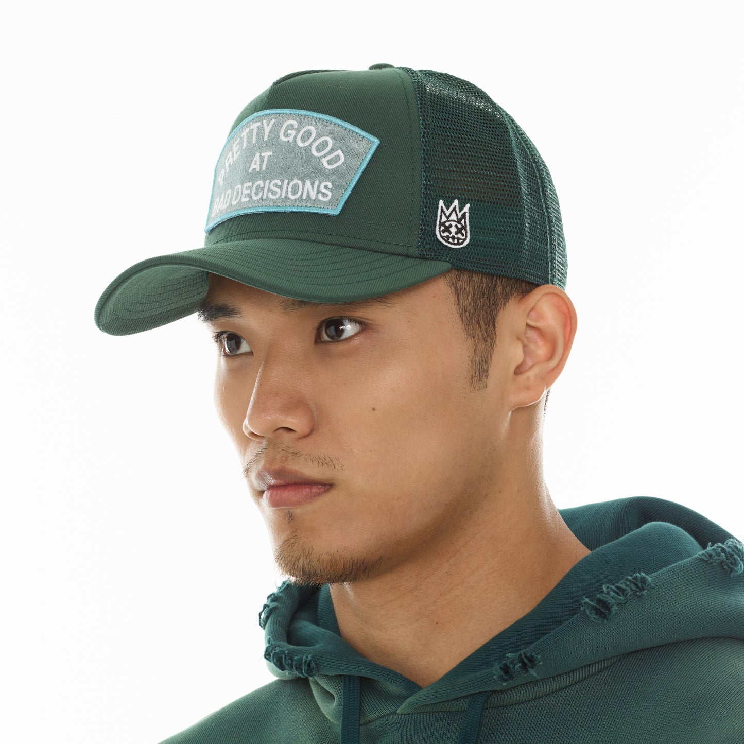 Cult's Mesh Trucker Hat "Good At Bad Decisions" In Bayberry