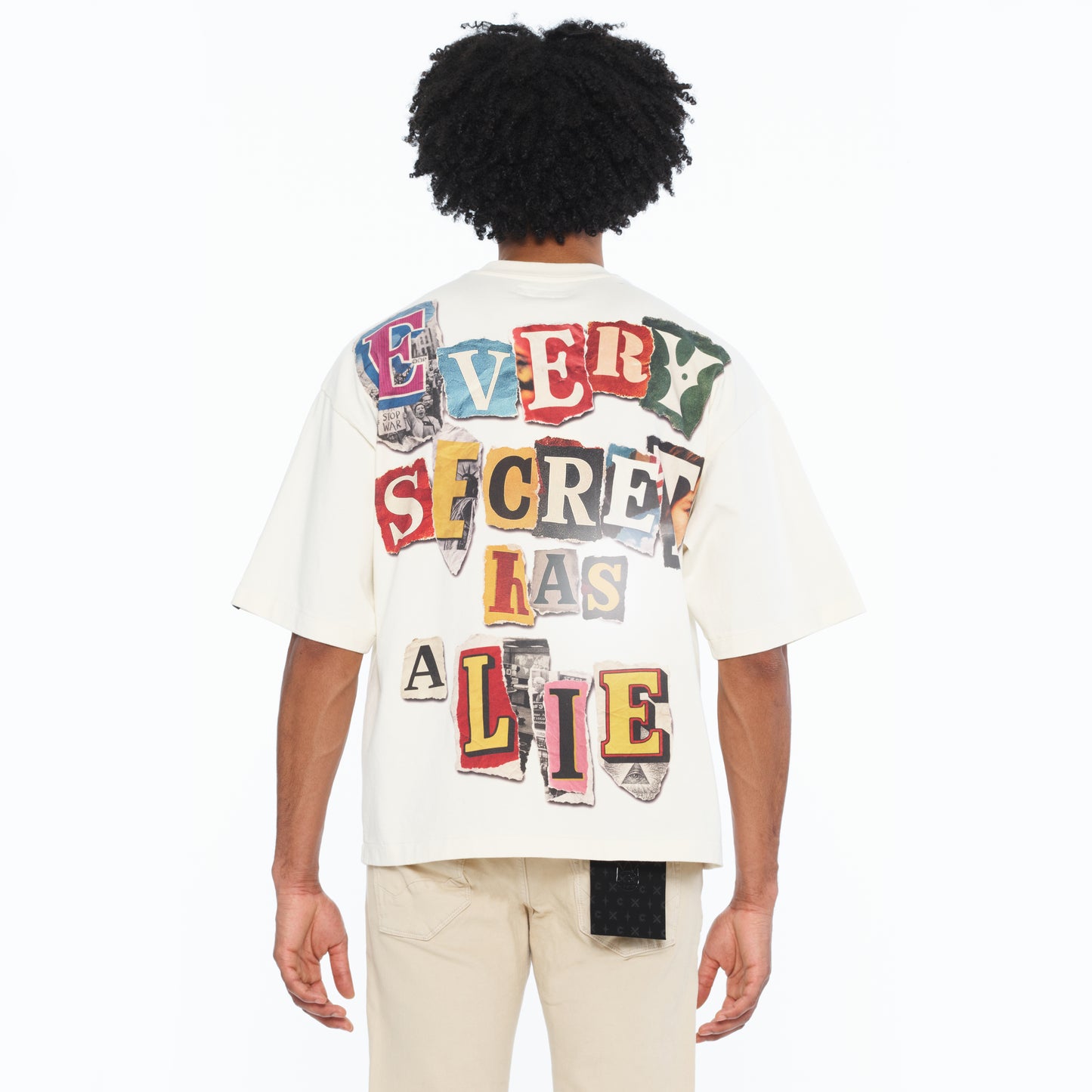 Cult's Oversized Short Sleeve Crew Neck Tee "Every Secret Has A Lie In Winter White