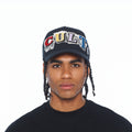 Cult's Mesh Back Trucker Hat "Cult Newsprint" In Black