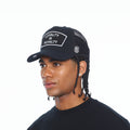 Cult's Mesh Back Trucker Hat "Loyalty Is Royalty" In Black