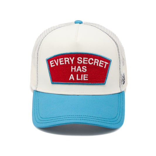Cult's Mesh Back Trucker Hat "Every Secret Has A Lie" In Winter White