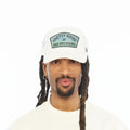 Cult's Mesh Back Trucker Hat "Pretty Good At Bad Decisions" In Winter White